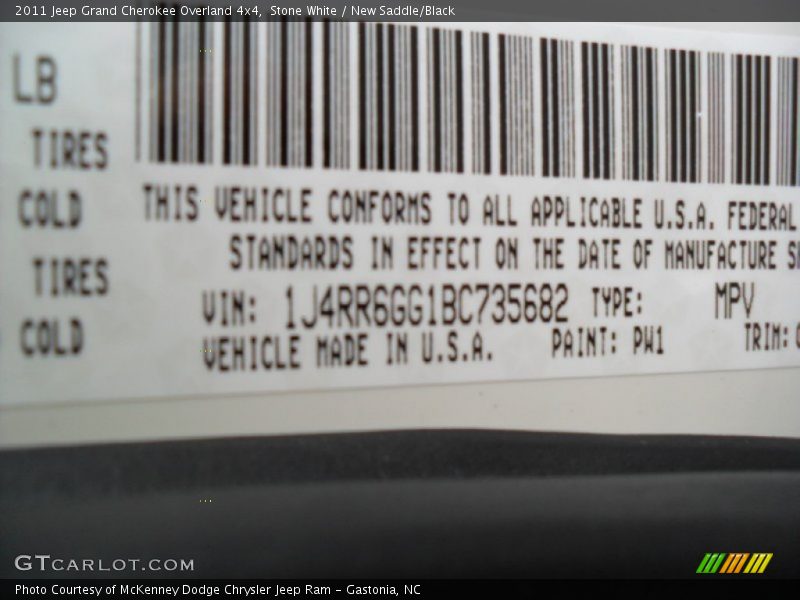 Stone White / New Saddle/Black 2011 Jeep Grand Cherokee Overland 4x4