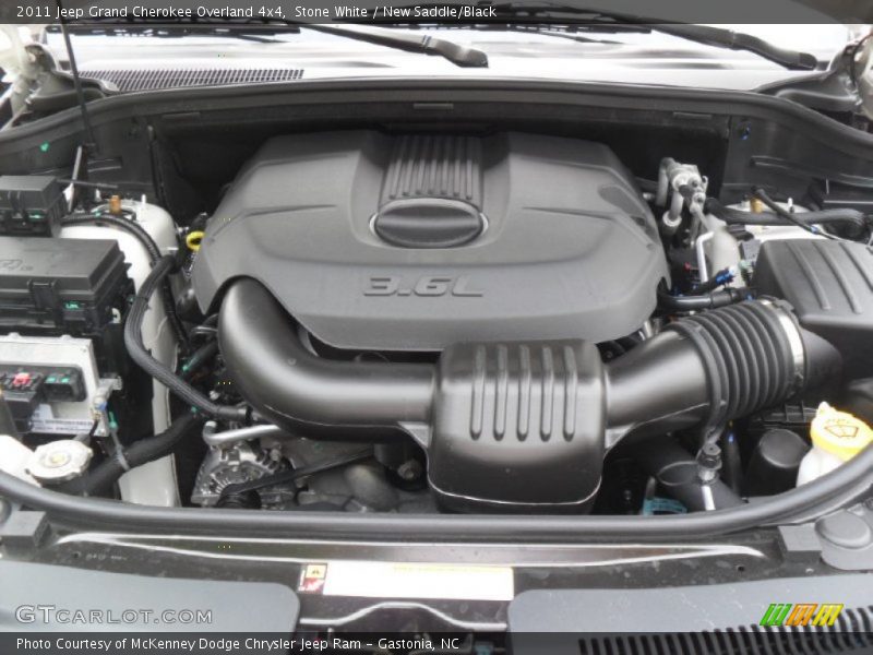 Stone White / New Saddle/Black 2011 Jeep Grand Cherokee Overland 4x4