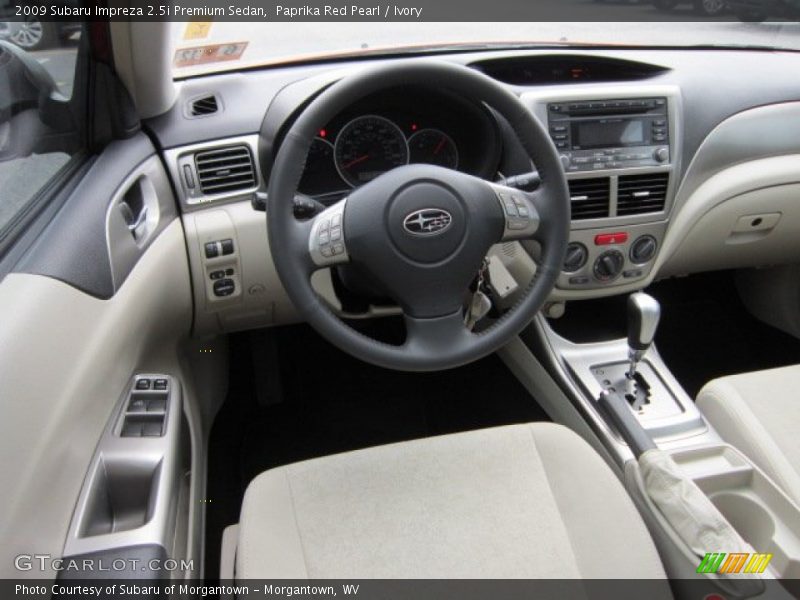 Paprika Red Pearl / Ivory 2009 Subaru Impreza 2.5i Premium Sedan