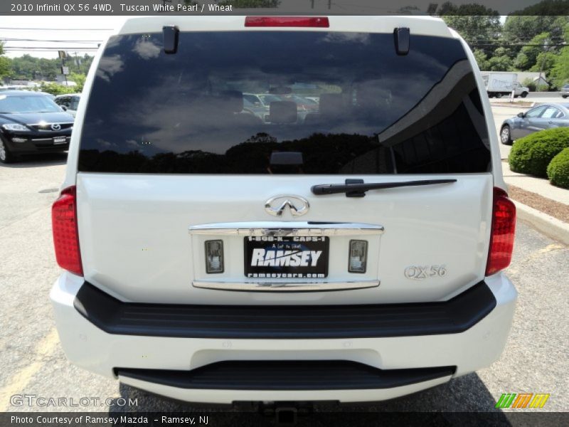 Tuscan White Pearl / Wheat 2010 Infiniti QX 56 4WD