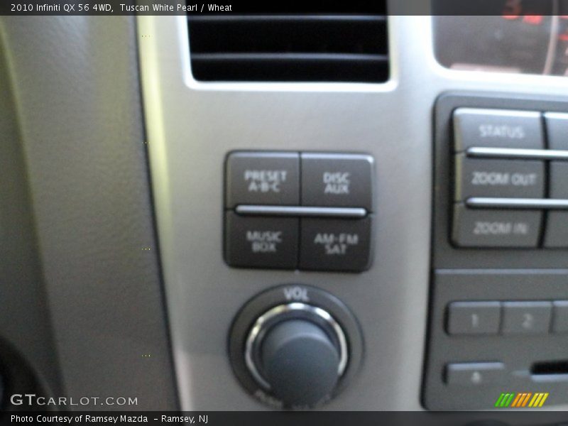 Tuscan White Pearl / Wheat 2010 Infiniti QX 56 4WD