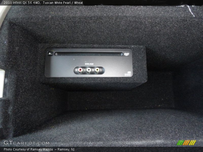 Tuscan White Pearl / Wheat 2010 Infiniti QX 56 4WD