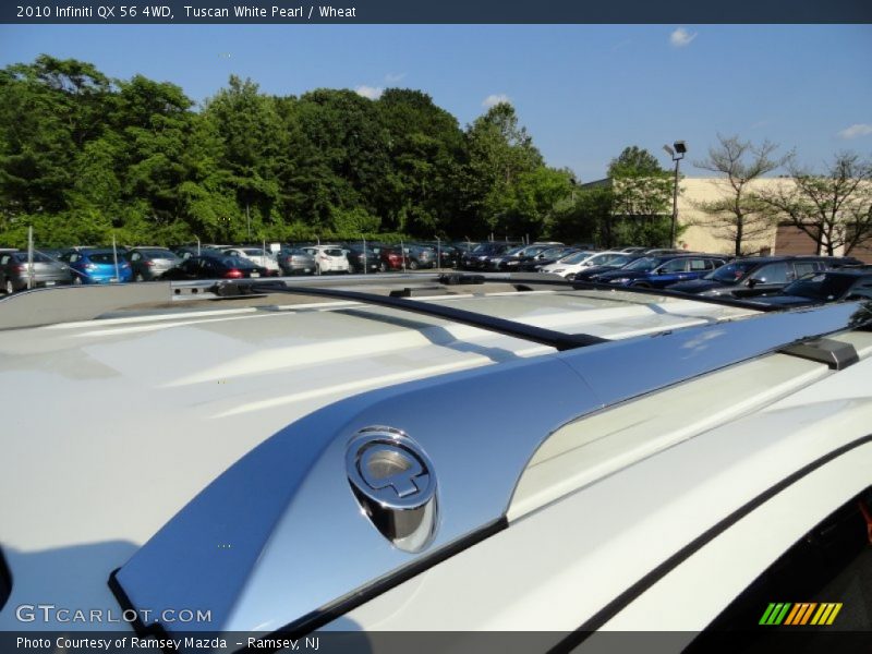 Tuscan White Pearl / Wheat 2010 Infiniti QX 56 4WD