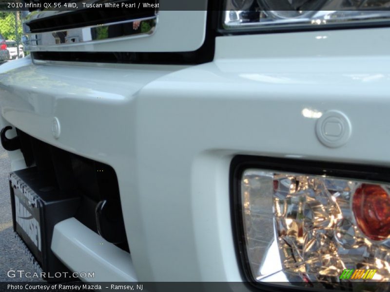 Tuscan White Pearl / Wheat 2010 Infiniti QX 56 4WD
