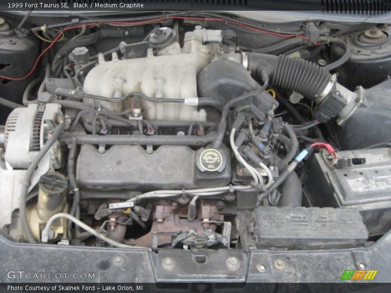 Black / Medium Graphite 1999 Ford Taurus SE