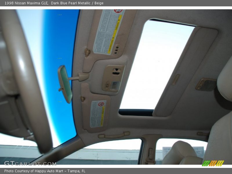 Dark Blue Pearl Metallic / Beige 1998 Nissan Maxima GLE