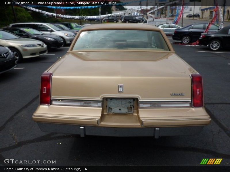 Sungold Metallic / Beige 1987 Oldsmobile Cutlass Supreme Coupe