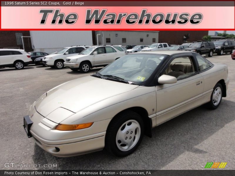 Gold / Beige 1996 Saturn S Series SC2 Coupe