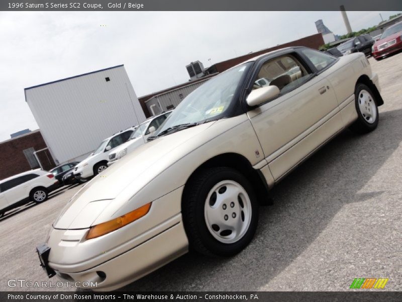 Gold / Beige 1996 Saturn S Series SC2 Coupe