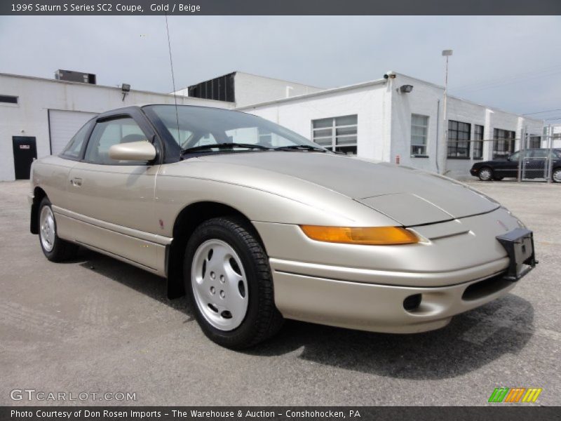 Gold / Beige 1996 Saturn S Series SC2 Coupe