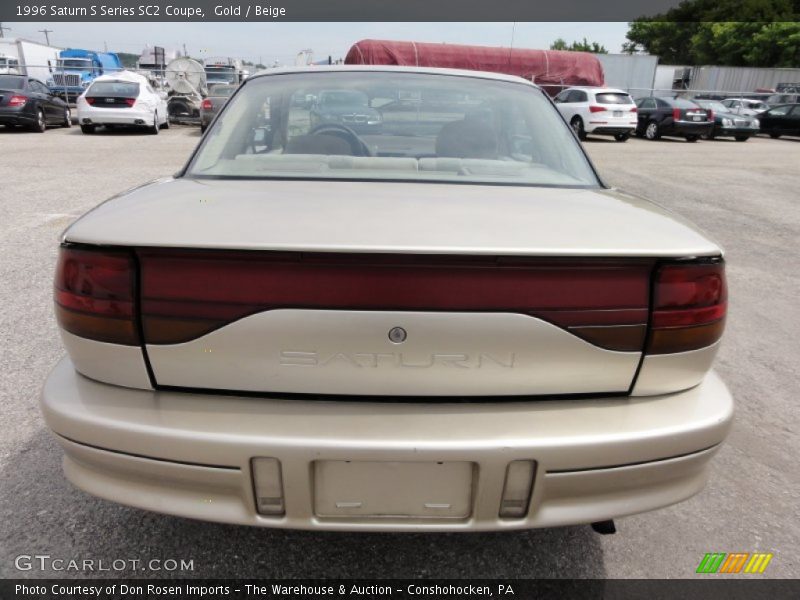 Gold / Beige 1996 Saturn S Series SC2 Coupe