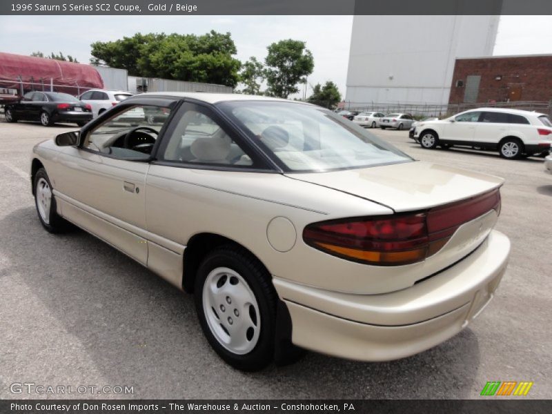 Gold / Beige 1996 Saturn S Series SC2 Coupe