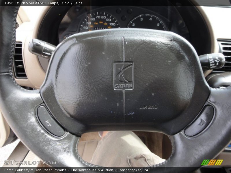 Gold / Beige 1996 Saturn S Series SC2 Coupe