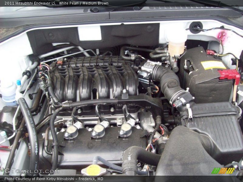 White Pearl / Medium Brown 2011 Mitsubishi Endeavor LS