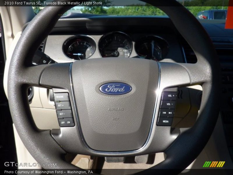 Tuxedo Black Metallic / Light Stone 2010 Ford Taurus SE