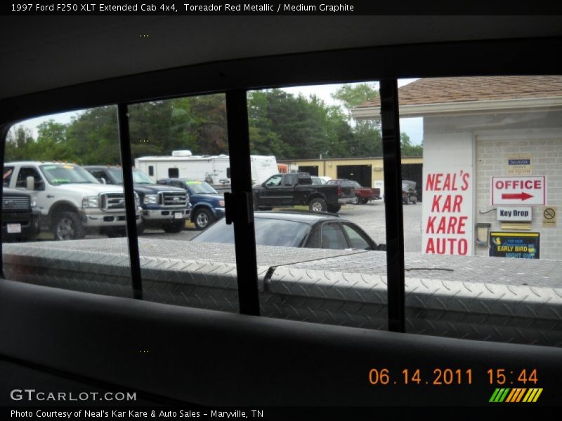 Toreador Red Metallic / Medium Graphite 1997 Ford F250 XLT Extended Cab 4x4