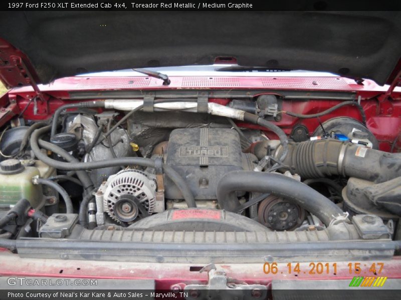Toreador Red Metallic / Medium Graphite 1997 Ford F250 XLT Extended Cab 4x4