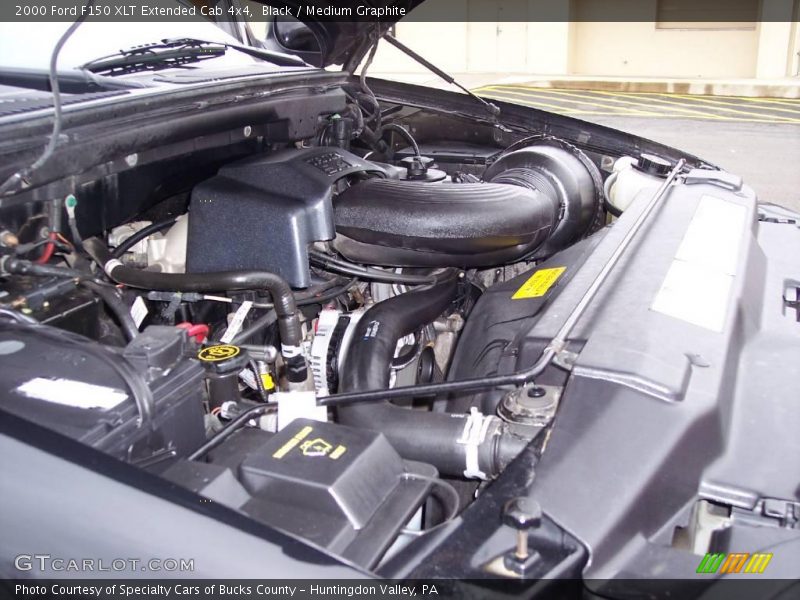 Black / Medium Graphite 2000 Ford F150 XLT Extended Cab 4x4