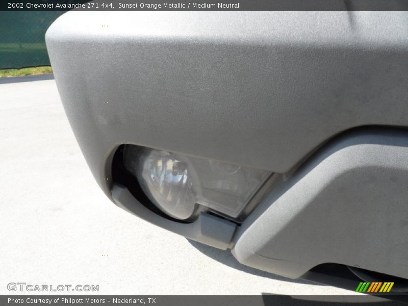 Sunset Orange Metallic / Medium Neutral 2002 Chevrolet Avalanche Z71 4x4