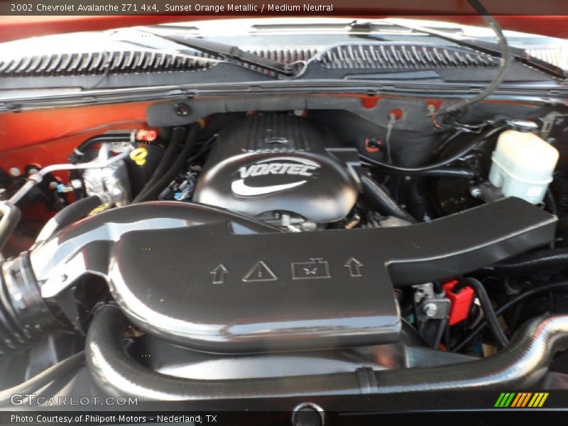 Sunset Orange Metallic / Medium Neutral 2002 Chevrolet Avalanche Z71 4x4