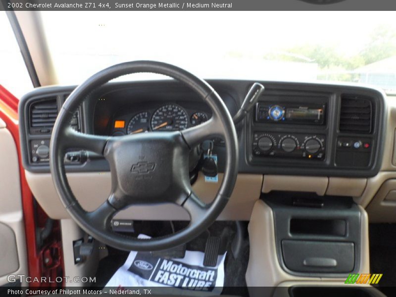 Sunset Orange Metallic / Medium Neutral 2002 Chevrolet Avalanche Z71 4x4
