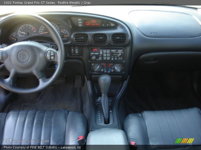 Redfire Metallic / Gray 2002 Pontiac Grand Prix GT Sedan