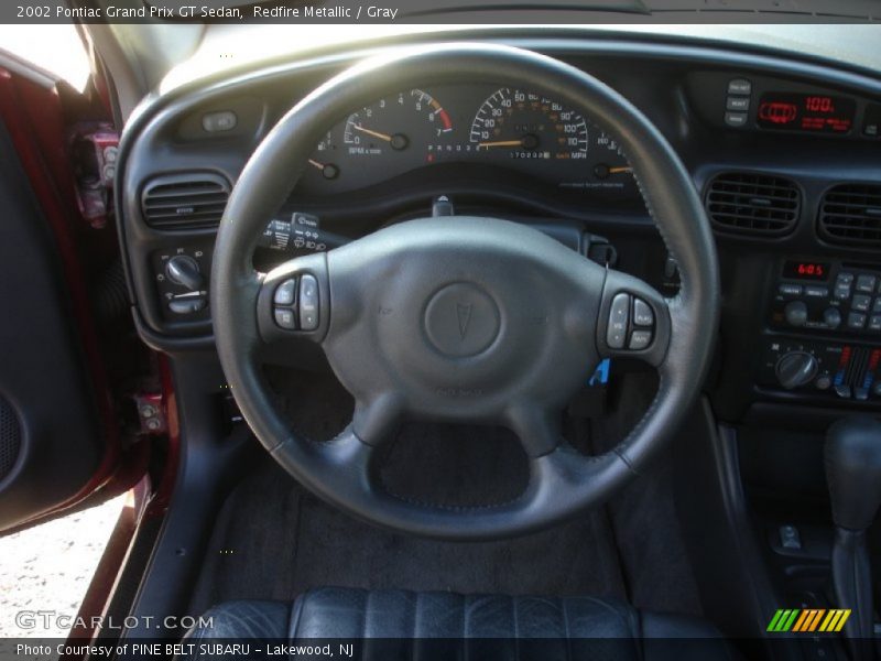 Redfire Metallic / Gray 2002 Pontiac Grand Prix GT Sedan