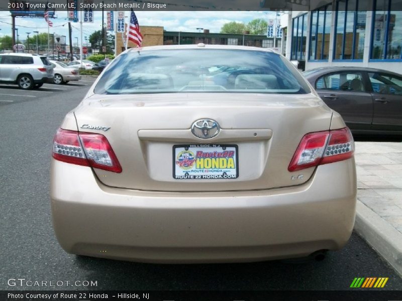 Sandy Beach Metallic / Bisque 2010 Toyota Camry LE