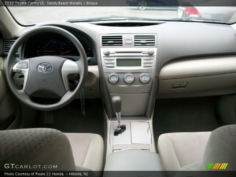 Sandy Beach Metallic / Bisque 2010 Toyota Camry LE