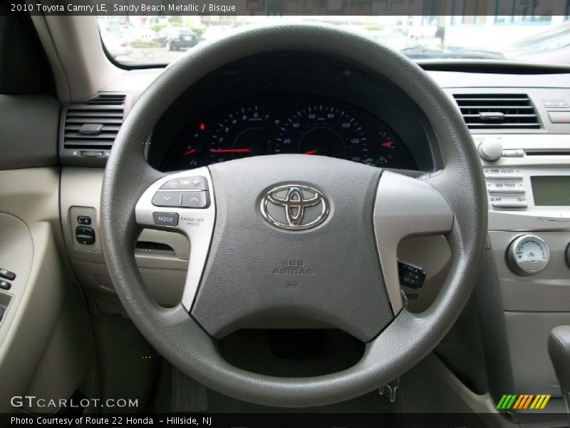 Sandy Beach Metallic / Bisque 2010 Toyota Camry LE