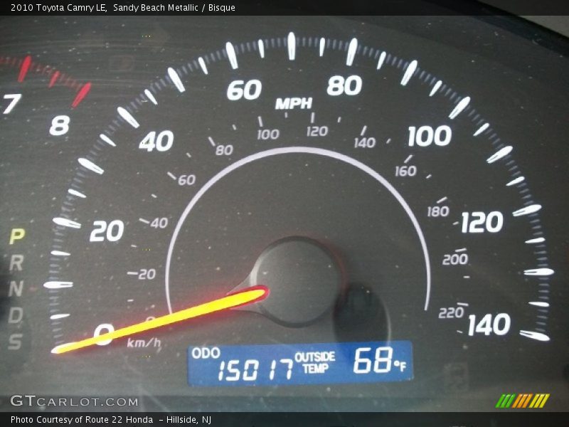 Sandy Beach Metallic / Bisque 2010 Toyota Camry LE