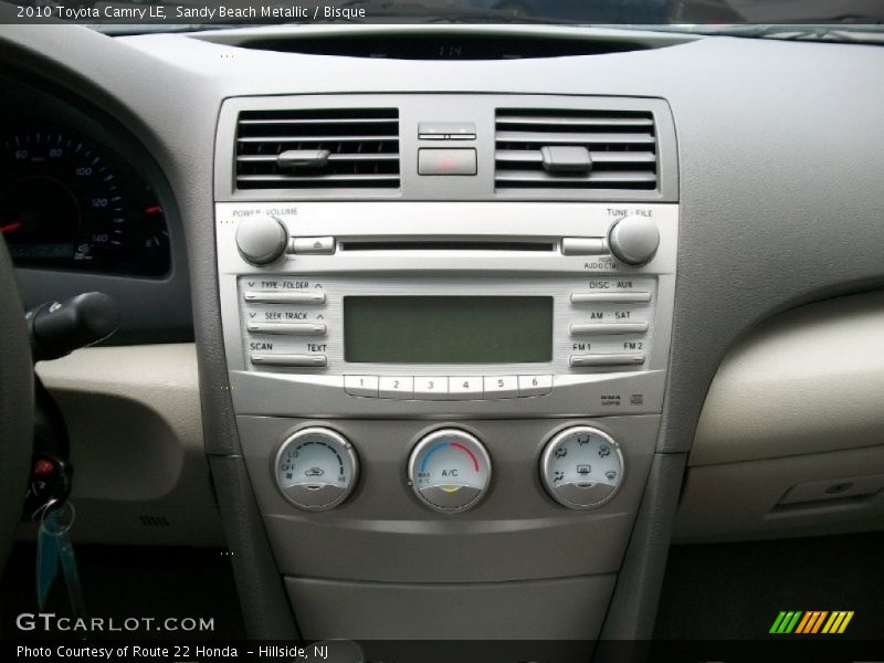 Sandy Beach Metallic / Bisque 2010 Toyota Camry LE
