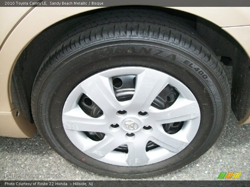 Sandy Beach Metallic / Bisque 2010 Toyota Camry LE