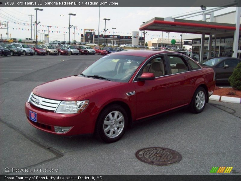 Sangria Red Metallic / Medium Light Stone 2009 Ford Taurus SE