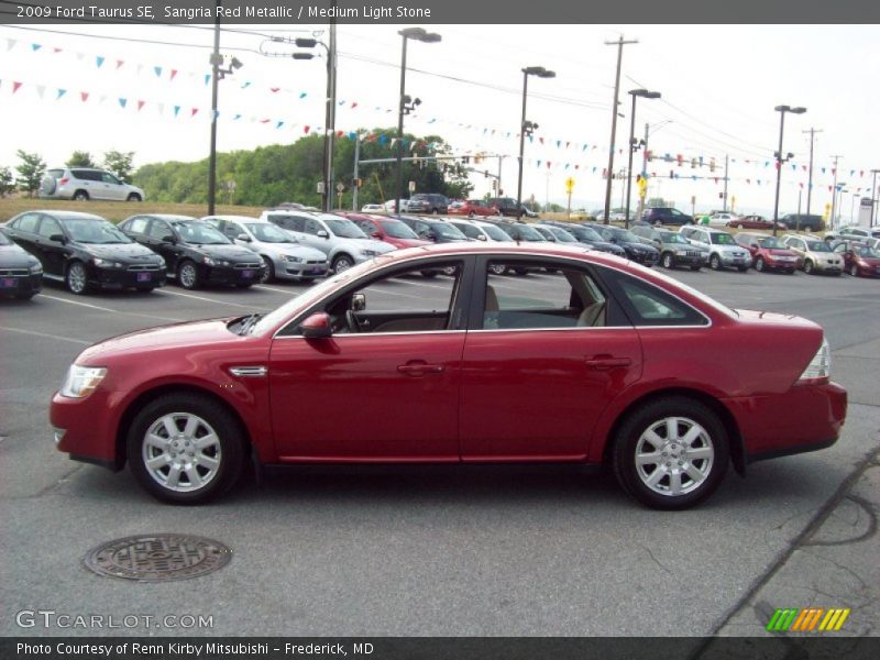 Sangria Red Metallic / Medium Light Stone 2009 Ford Taurus SE