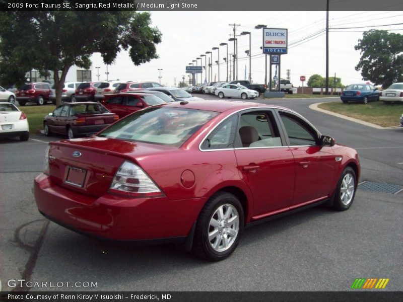 Sangria Red Metallic / Medium Light Stone 2009 Ford Taurus SE