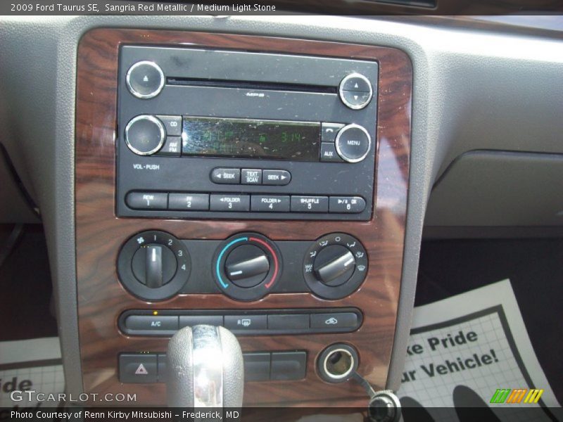 Sangria Red Metallic / Medium Light Stone 2009 Ford Taurus SE