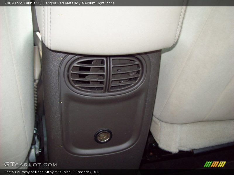 Sangria Red Metallic / Medium Light Stone 2009 Ford Taurus SE