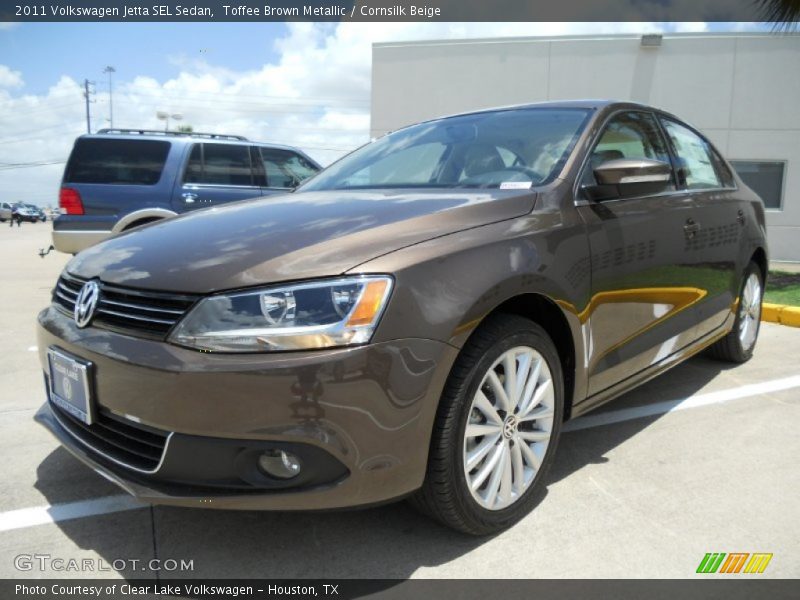 Toffee Brown Metallic / Cornsilk Beige 2011 Volkswagen Jetta SEL Sedan