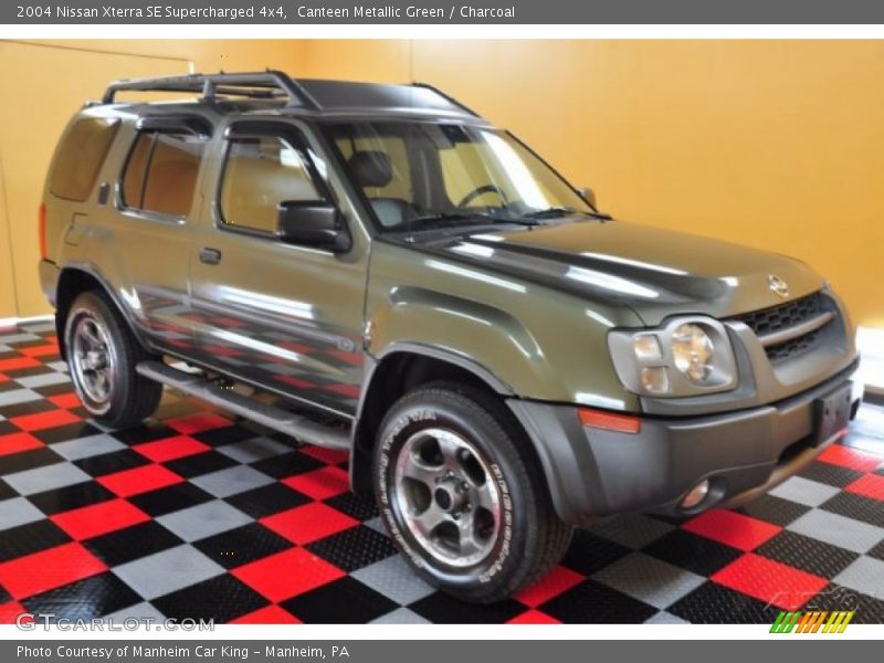 Front 3/4 View of 2004 Xterra SE Supercharged 4x4