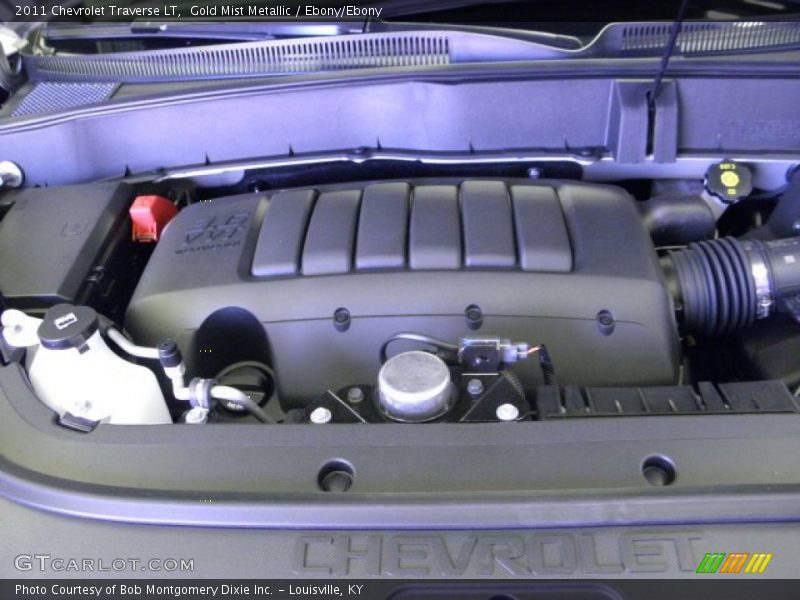 Gold Mist Metallic / Ebony/Ebony 2011 Chevrolet Traverse LT
