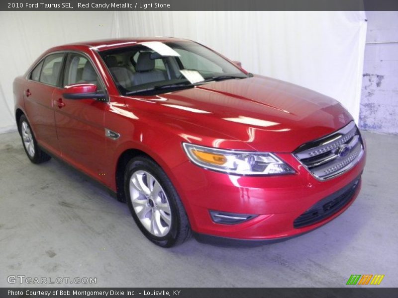 Red Candy Metallic / Light Stone 2010 Ford Taurus SEL