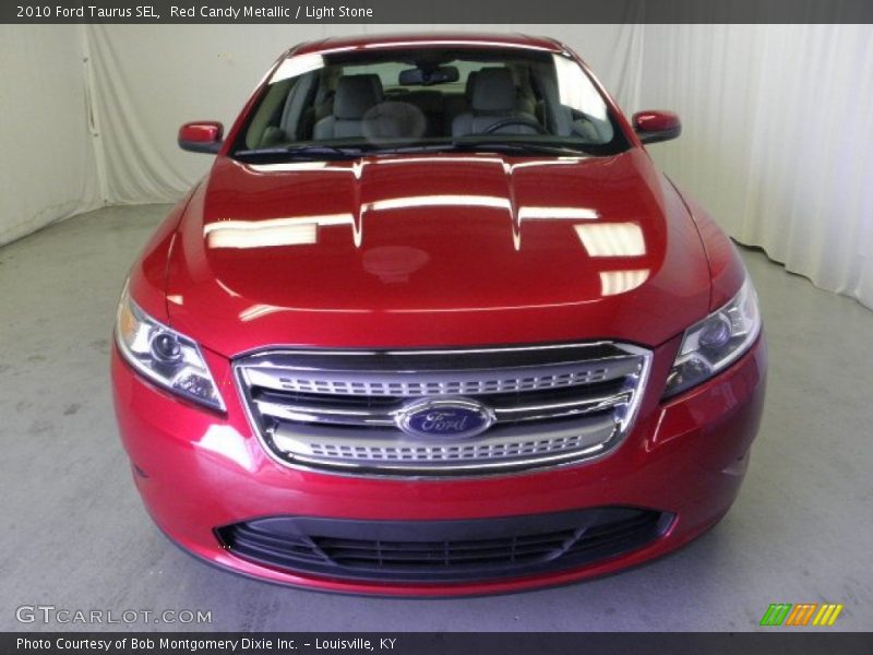Red Candy Metallic / Light Stone 2010 Ford Taurus SEL