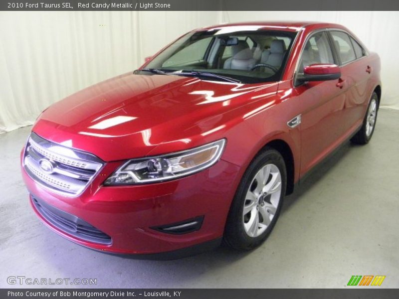 Red Candy Metallic / Light Stone 2010 Ford Taurus SEL