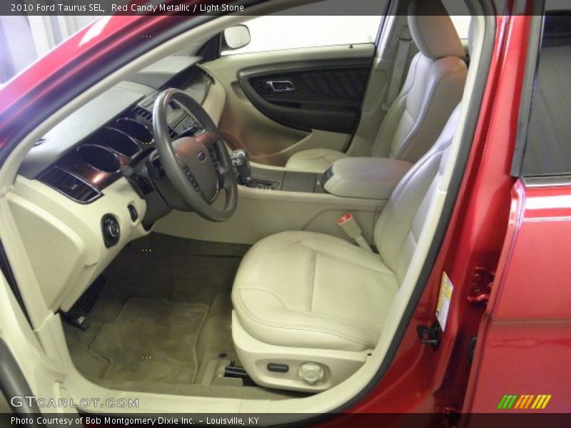 Red Candy Metallic / Light Stone 2010 Ford Taurus SEL