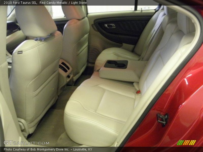Red Candy Metallic / Light Stone 2010 Ford Taurus SEL