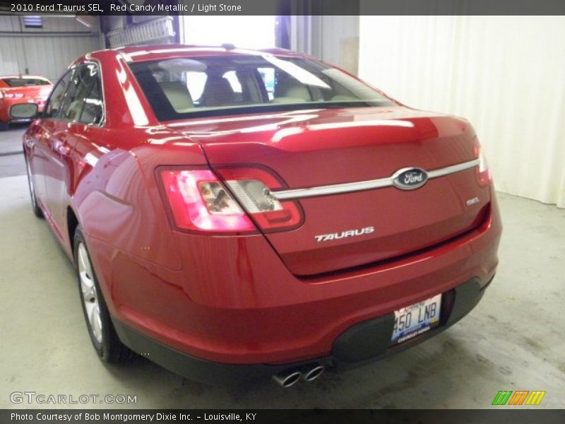 Red Candy Metallic / Light Stone 2010 Ford Taurus SEL
