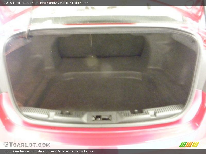 Red Candy Metallic / Light Stone 2010 Ford Taurus SEL