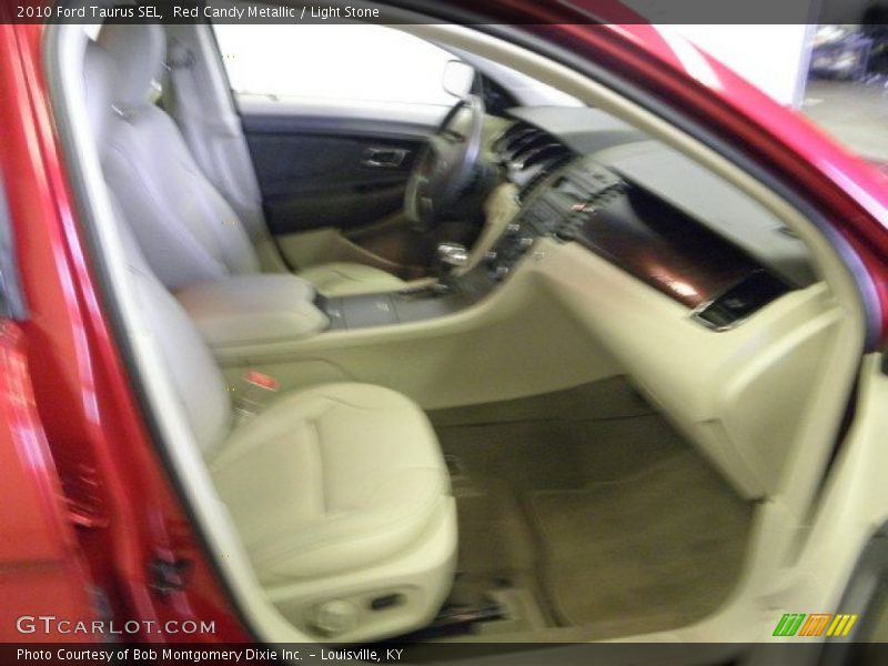 Red Candy Metallic / Light Stone 2010 Ford Taurus SEL