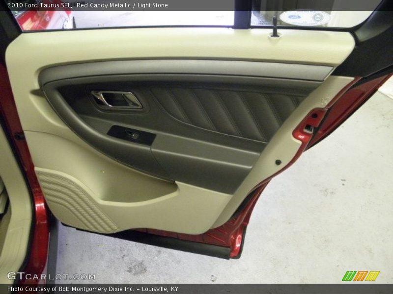 Red Candy Metallic / Light Stone 2010 Ford Taurus SEL